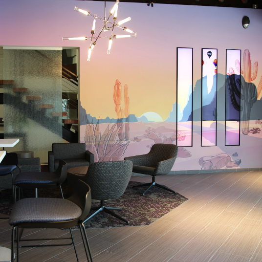 Colorful lobby mural with stretch screens 